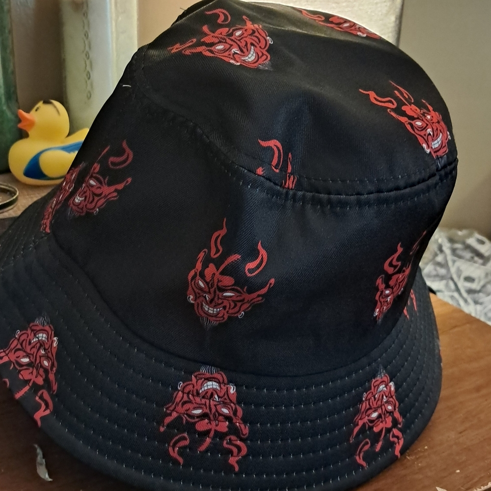 Black bucket hat with red devils